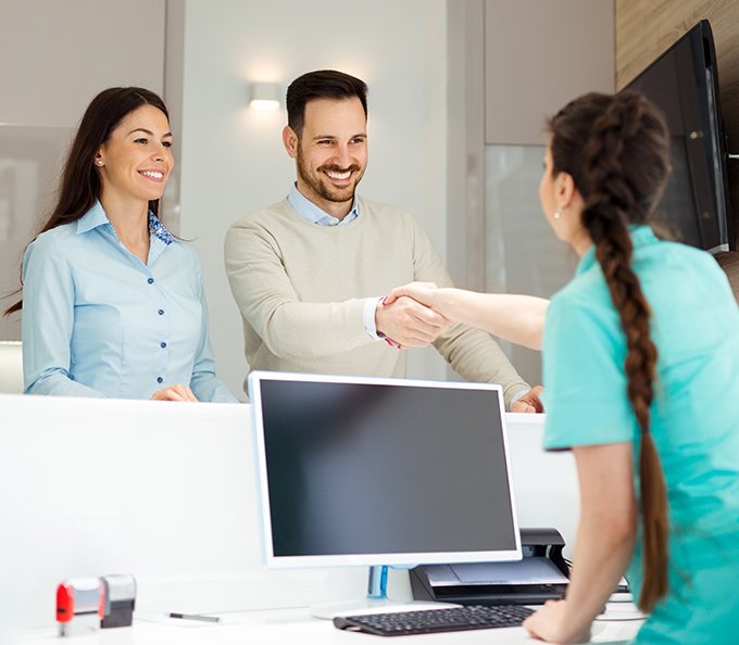 Couple meeting a receptionist