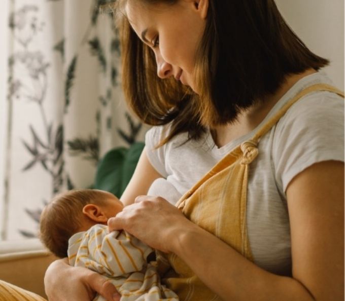 Mother breastfeeding her baby